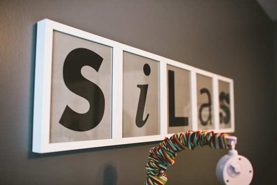 Dancing Commas | Silas' Nursery: Name art above crib