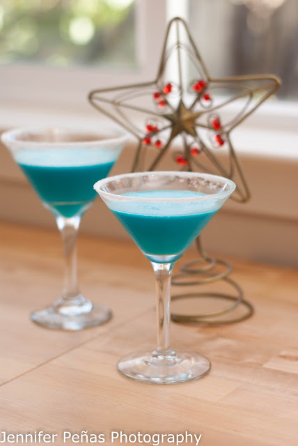 silent night cocktail, coconut rum, malibu rum, pineapple juice, blue curacao, white creme de cacao, whipping cream, christmas cocktail