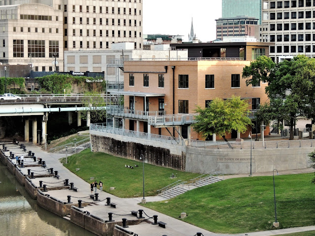 Allen's Landing with redeveloped Sunset Coffee Building - View down from Main Street Bridge Allen's Landing with redeveloped Sunset Coffee Building - View down from Main Street Bridge