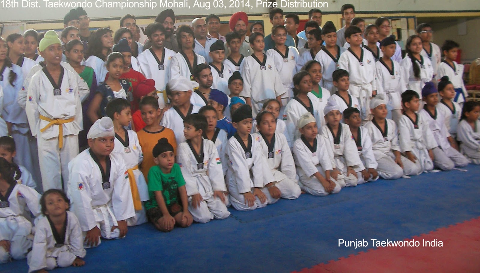 Winner players in a Group Photo after Prize Distribution at 18th District Taekwondo Championship, Mohali near Chandigarh, Punjab, with the Chief Guest, other Guest of Honour personalities & Master Satpal Singh Rehal