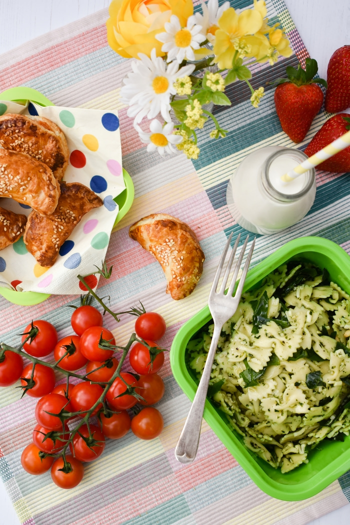 Easy Vegan Mini Spinach & Cream Cheese Puff Parcels Easy Vegan Mini Spinach & Cream Cheese Puff Parcels in a picnic spread with pasta salad and cherry tomatoes