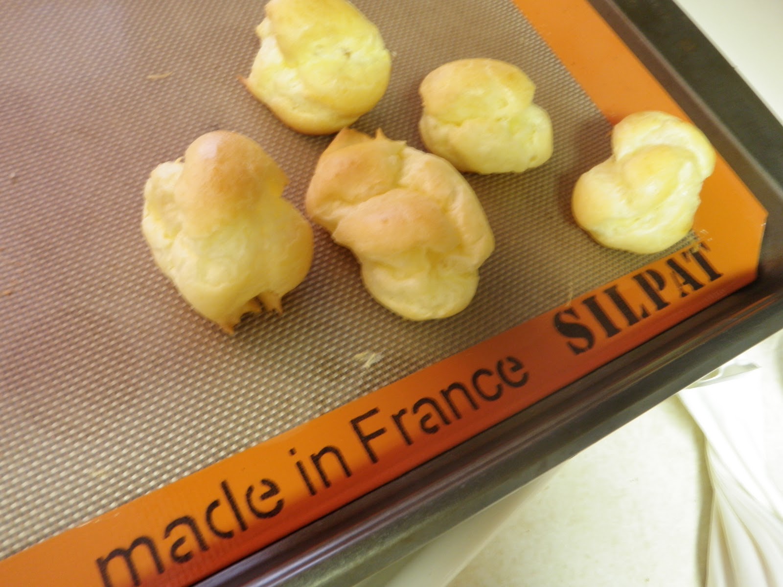 Cake Optimist Lobster Tails and Cream Puffs