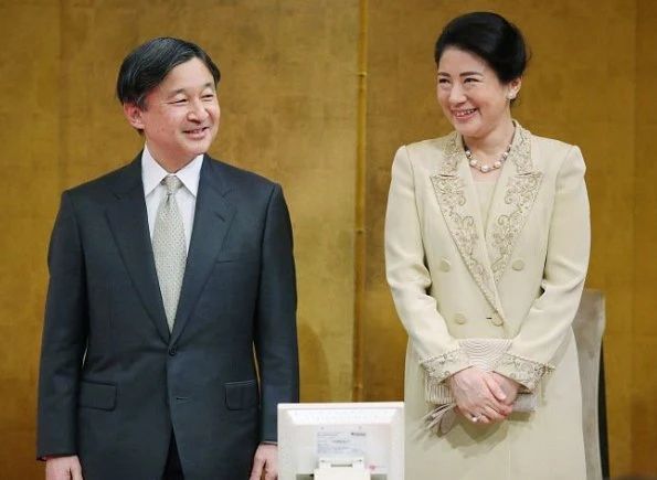 Crown Princess Masako is wearing a dress from the 1990s, or a beige dress with similar design 