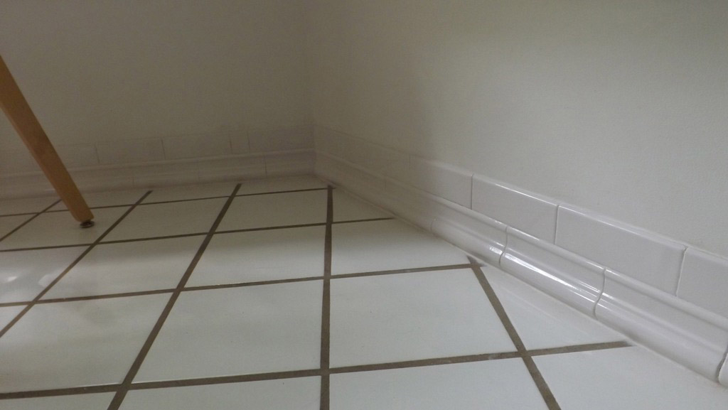 MARIETTE'S BACK TO BASICS {Tile Baseboard in Our Kitchen}