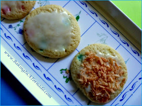 Tropical Storm Cookies: a soft cookie with the hint of a pineapple filled with soft tropical flavored candy, glazed and topped with toasted pineapple | Recipe developed by www.BakingInATornado.com | #recipe #cookies