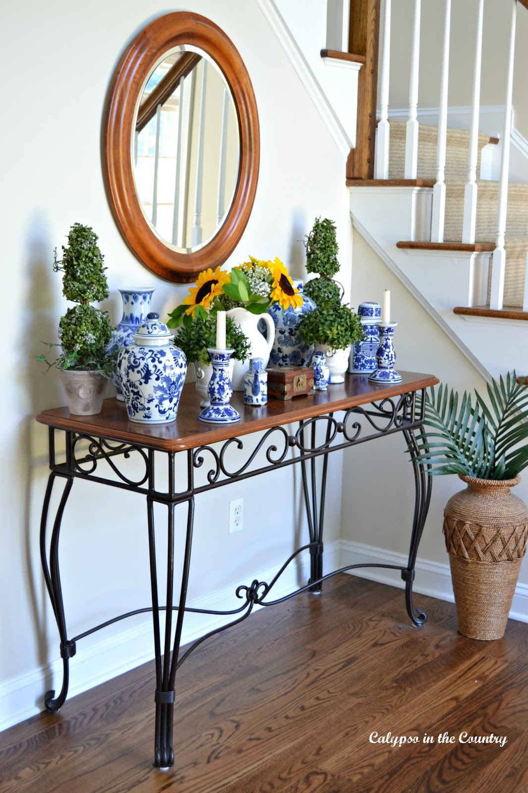 Foyer Console Table Decorated with Sunflowers and Blue and White