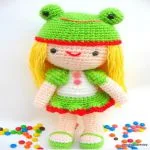 http://www.craftsy.com/pattern/crocheting/toy/kelly-girl-with-frog-hat-crochet-ami/13403?rceId=1447967529617~guj87q1g