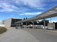 covered walkway up to entrance of T2 new train station of Milan Malpensa Airport Terminal 2