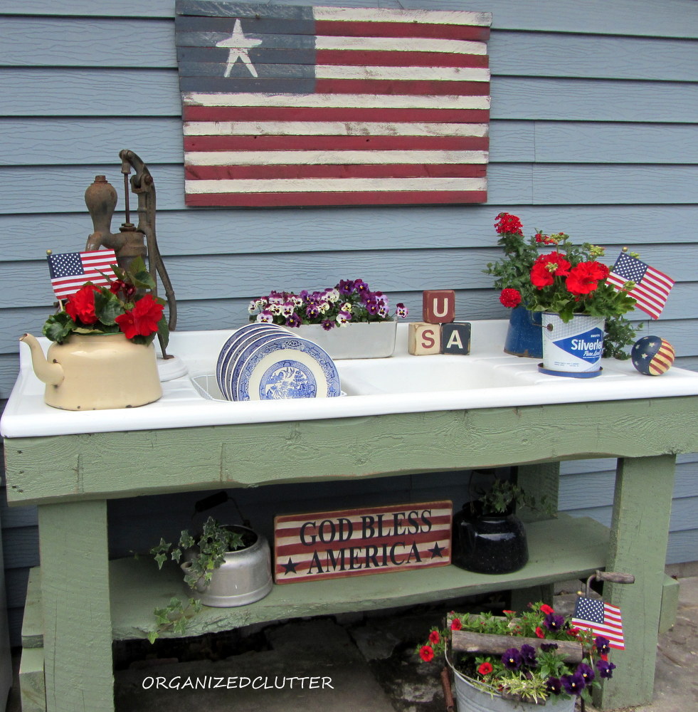 A Red White And Blue Potting Bench Organized Clutter