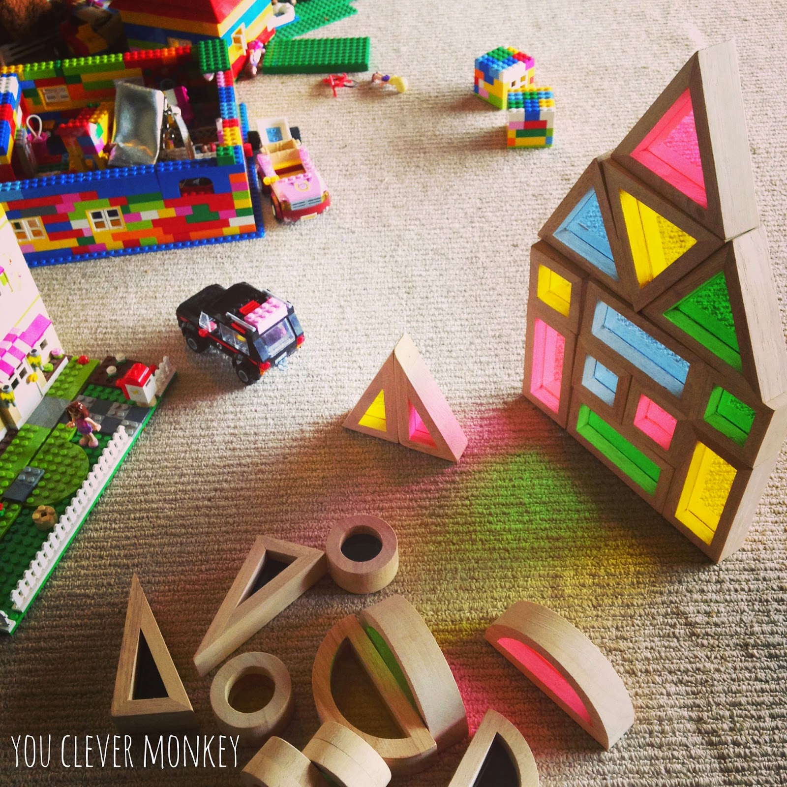 Exploring fractions with wooden rainbow blocks.  For more, visit www.youclevermonkey.com