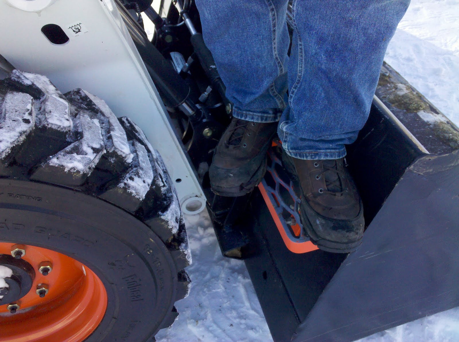 Herbold Metal Werks AgriStep Skid loader bucket steps