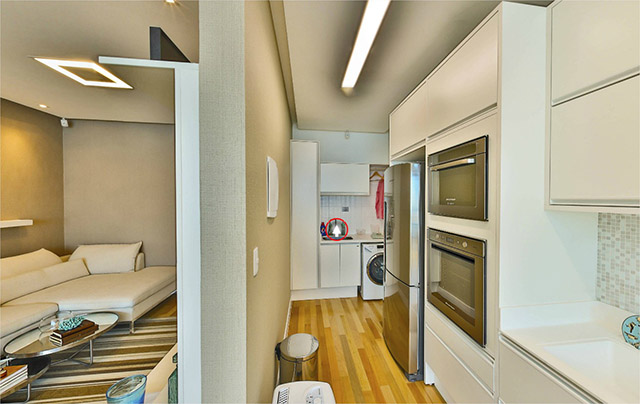 Apartamento decorado em bege e turquesa com cozinha americana apartamento-decorado-cozinha-americana-achadosdedecoracao
