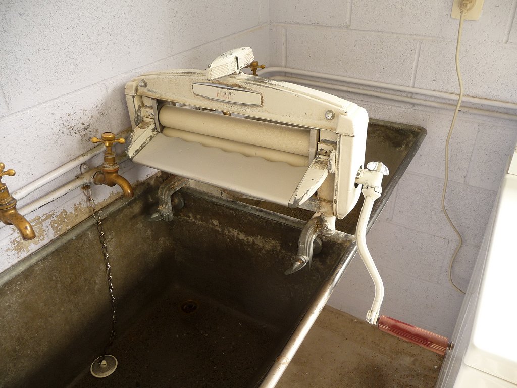 Janine surviving and WASHING clothes.