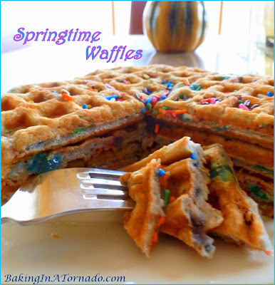 Springtime Waffles, the colors of spring add to the fun of these waffles with some surprise ingredients. For Easter or any occasion. | Recipe developed by www.BakingInATornado.com | #recipe #breakfast #Easter