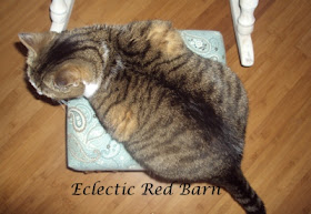 Eclectic Red Barn: Claire on top of the foot stool