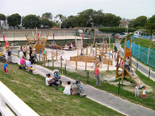 wooden frame play area with sand pits