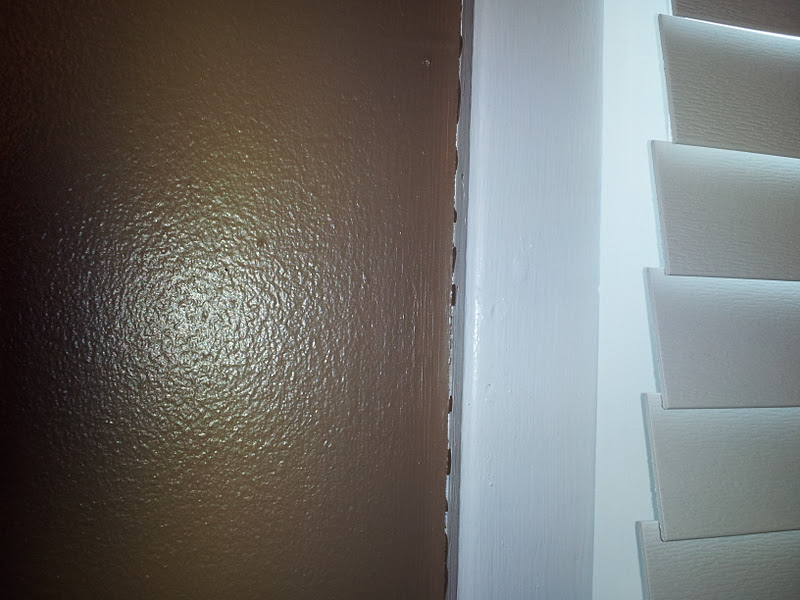 Working House Mom, Wife Use Caulk for Crisp Lines When Painting