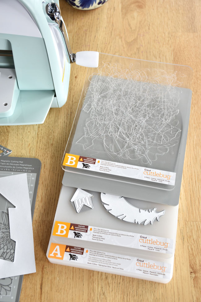 Woman in Real Life A DIY Cricut Cuttlebug Feather & Foliage Mobile