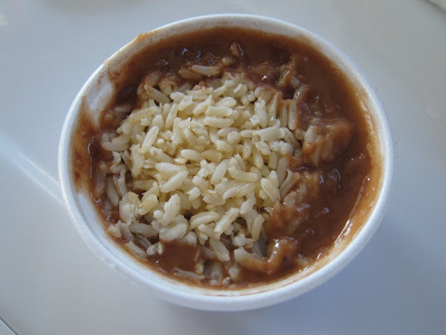 Individual-sized Popeyes Red Beans and Rice.
