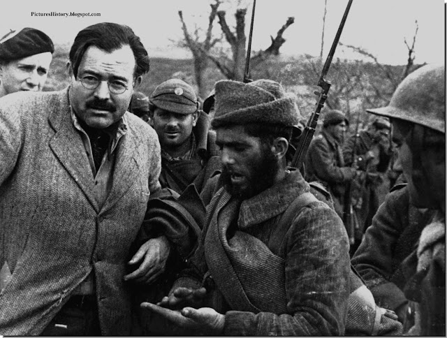 Ernest Hemingway with Republican soldiers on the Aragon front in a photo by Robert Capa Spanish civil war Ernest Hemingway Republican soldiers Aragon photo Robert Capa