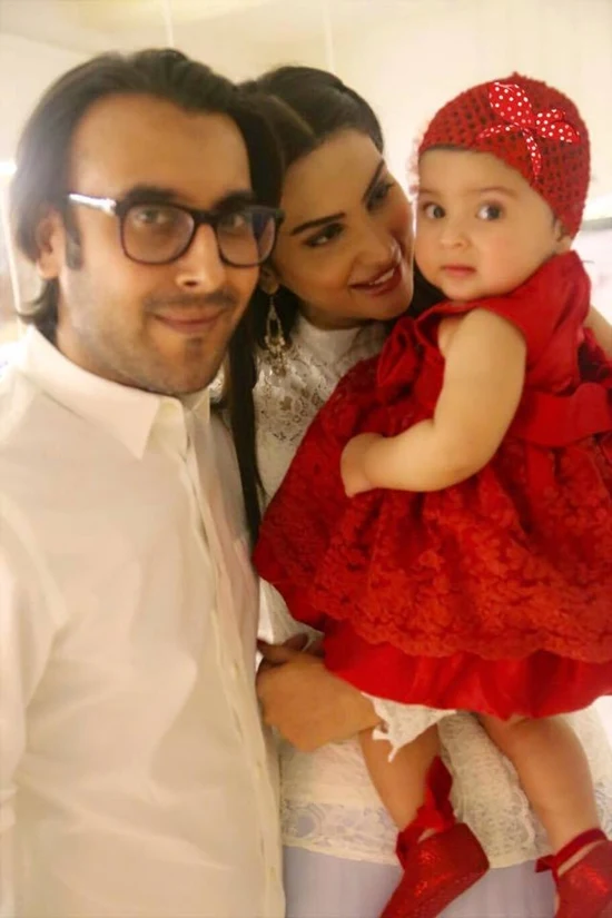 Fiza Ali with her husband and daughter