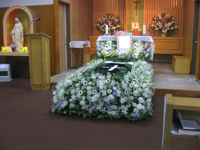 敦賀海の星カトリック教会で式。洗礼名名マリア