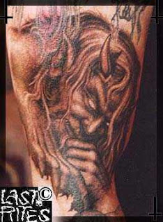 The Undertaker tattoos - WWE Superstar Undertaker Tattoo Designs