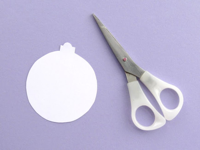 Cutting out the bauble shape
