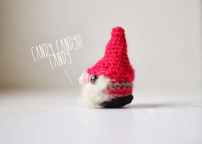 Christmas gnome amigurumi from the side.