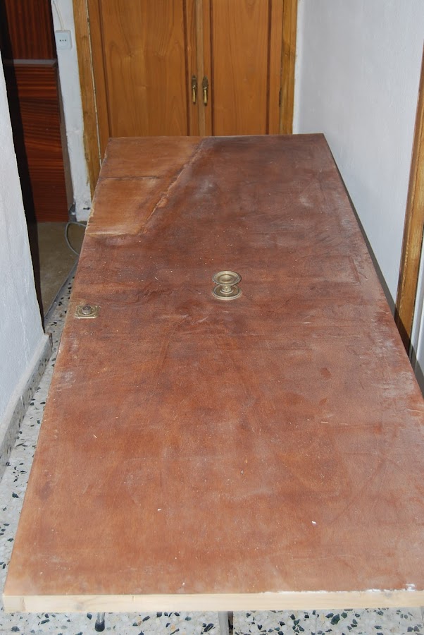 Como he forrado una puerta con madera reciclada