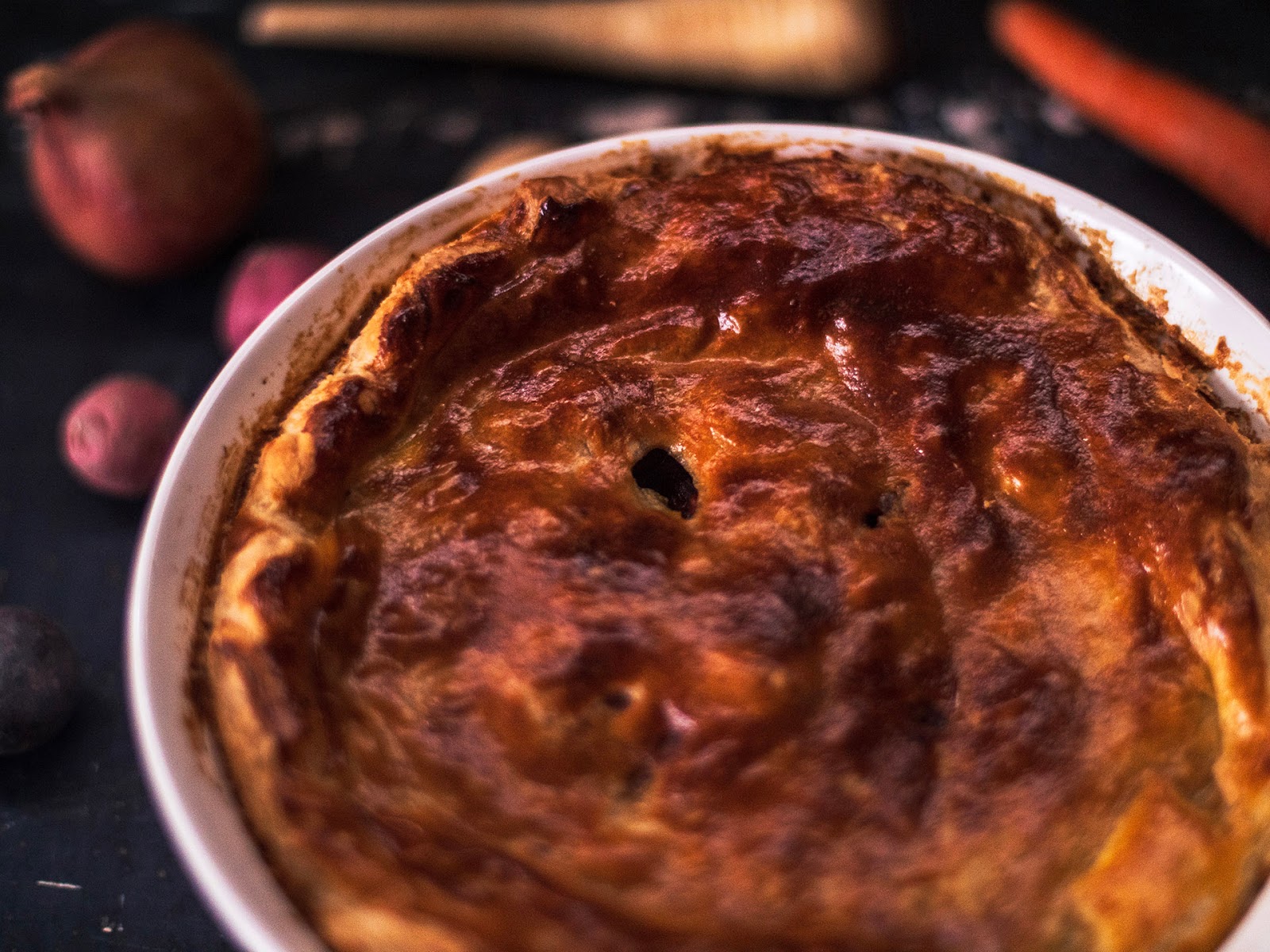 Irish Beef and Stout Pot Pie close up on the golden crust | Local Food Rocks