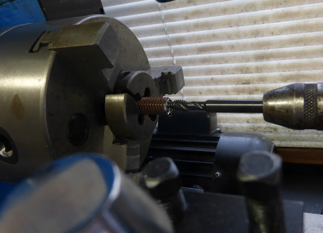 tapping bolt in lathe