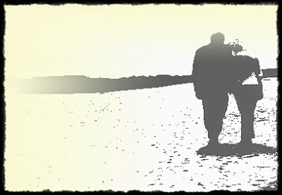 OLd couple walking on beach
