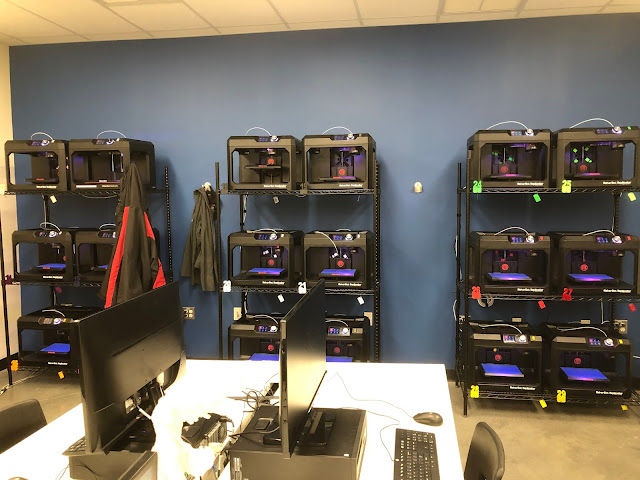 thirty-six 3D printers