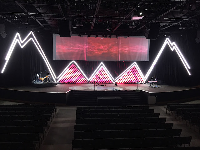 The Christian Life Center, a 15,000-square-foot sanctuary holding up to 1,200 worshipers, at Anastasia Baptist Church in St. Augustine, Florida, featuring new video and lighting systems sourced through Guitar Center Professional. guitar center professional, house of worship installation, AV, audio, video