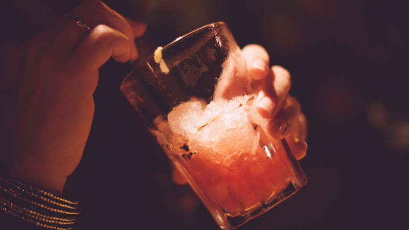 Girl Drinking a Cocktail HD