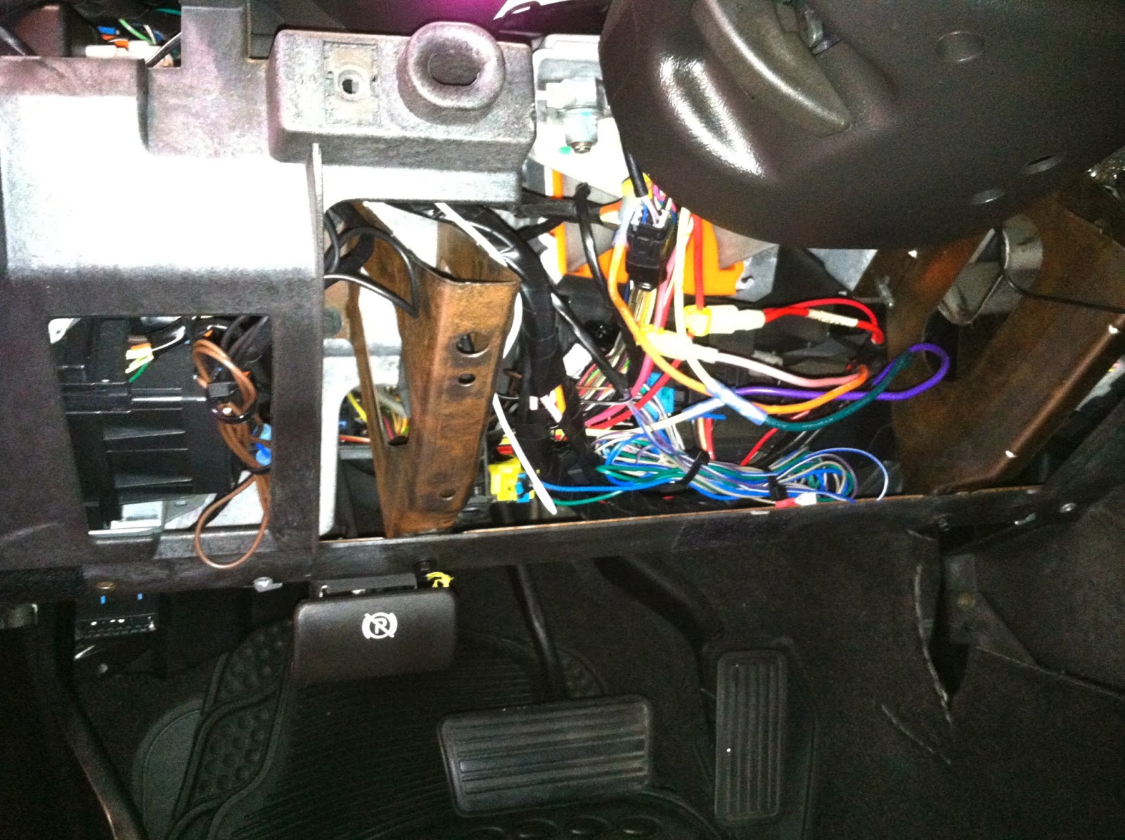 Car Audio Tips Tricks and How To's : Hummer H2 Stereo Removal-Remote Start