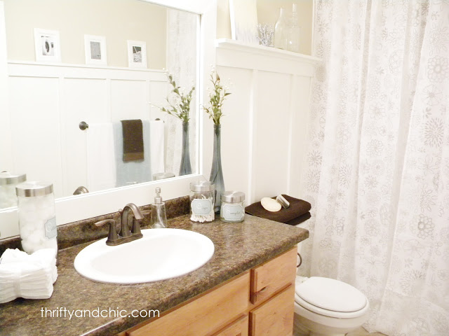 Farmhouse style house tour. House tour full of before and afters. How to transform a builder grade house. DIY farmhouse decor and decorating ideas. DIY cottage decor and decorating ideas. DIY Board and batten in bathroom. Coastal Bathroom decor