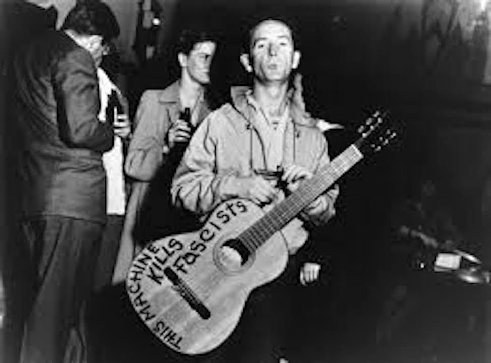 Essay woody guthrie image