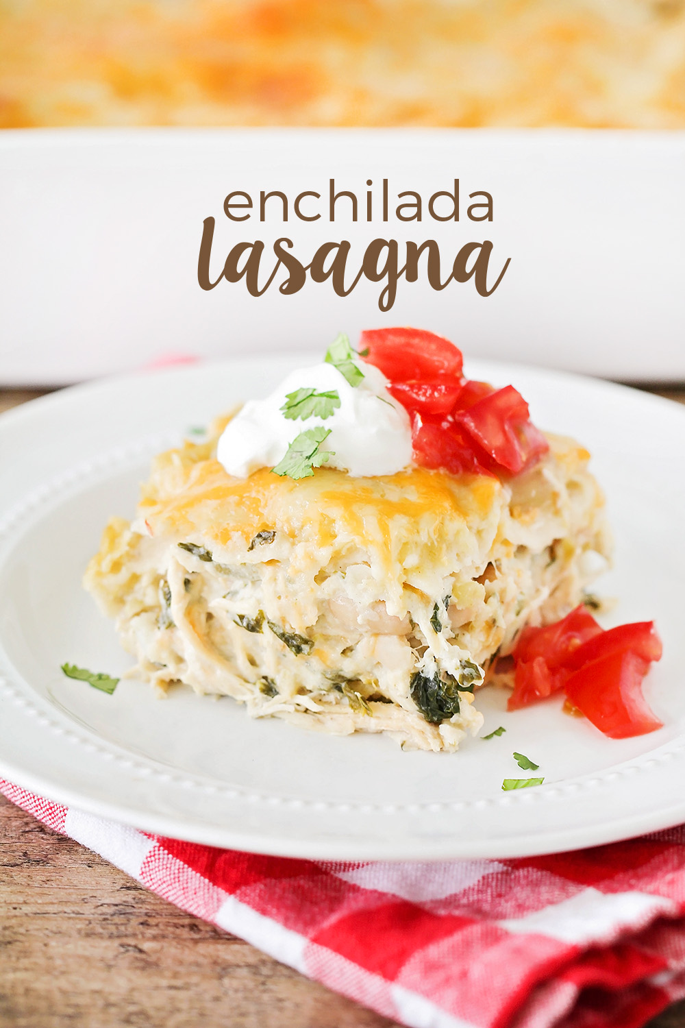 This creamy, cheesy, baked enchilada lasagna is so easy to make and so flavorful! It's a hearty and delicious meal that everyone will love!