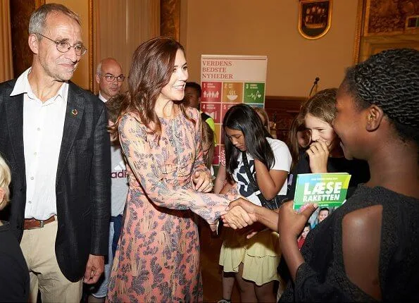 Crown Princess Mary wore a H&M silk dress and a Gianvito Rossi python pointed toe pumps