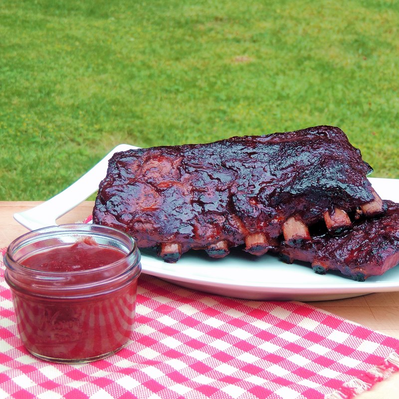  Roasted Strawberry BBQ Sauce - I love roasting just about any fruit or vegetable, so it seemed only natural to add one to a BBQ sauce recipe. I had no idea how wonderful it would turn out, and quickly become a family favorite! #BBQ #grilling #beef #pork #chicken #sauce #fruit #strawberry #recipe | bobbiskozykitchen.com