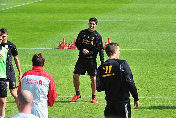 He can't play for another few months but Luis Suárez is back in Liverpool first-team fold
