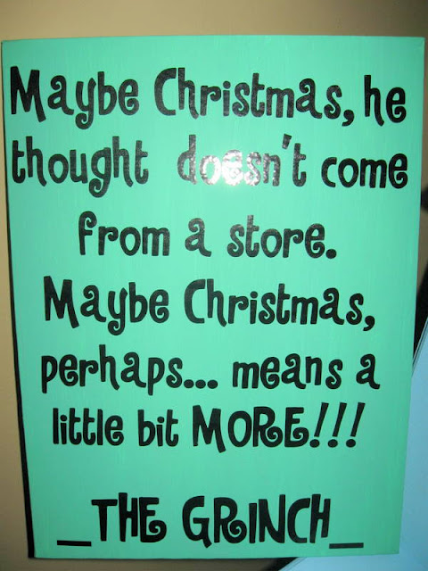 A homemade Grinch party decoration on a green canvas with black lettering. The canvas has a quote, "Maybe Christmas, he thought doesn't  come from a store. Maybe Christmas,  perhaps...means a little bit more" and the quote is  attributed  to The Grinch