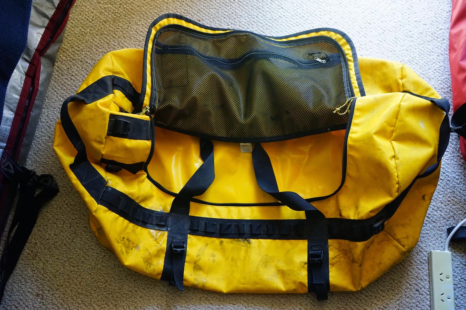 north face duffel carry on size