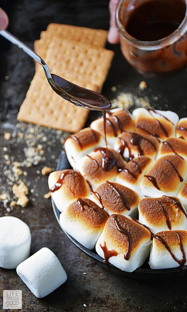 Skillet S'mores Dip | by Life Tastes Good. This indoor s'mores recipe is an easy recipe with just 4 ingredients and ready in only 5 minutes. No campfire needed! Great for a quick snack, dessert, or party appetizer. #LTGrecipes