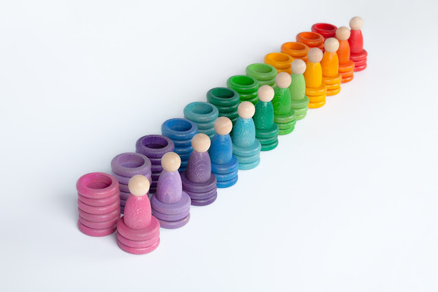 Joguines Grapat: monedas, anillas y niños de madera