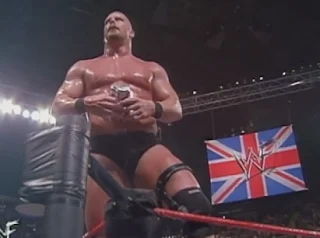 WWE / WWF - No Mercy 1999 (UK VERSION) - WWF Champion Stone Cold Steve Austin celebrates his win over Undertaker and Triple H