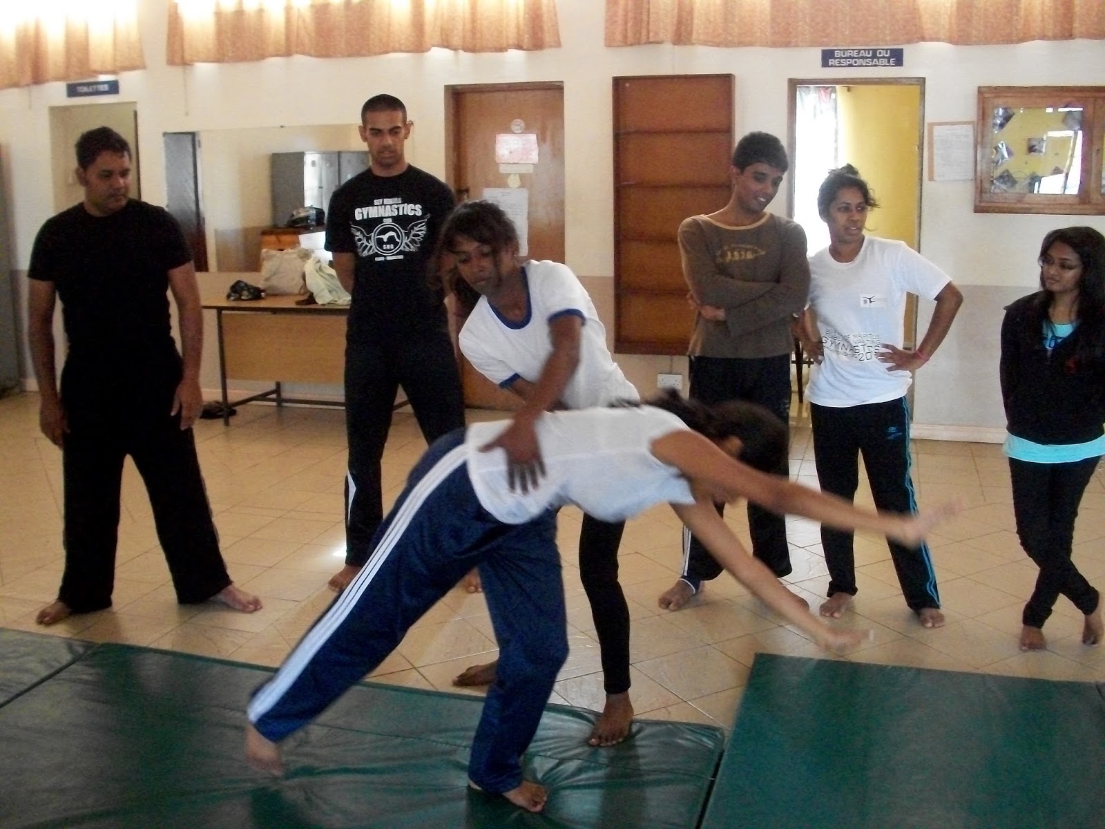 Sly Ninjas Gymnastics Club BASIC GYMNASTICS COACHING AND SPOTTING