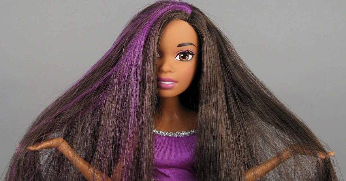Wal-Mart, Toys R Us price black, white Barbies differently